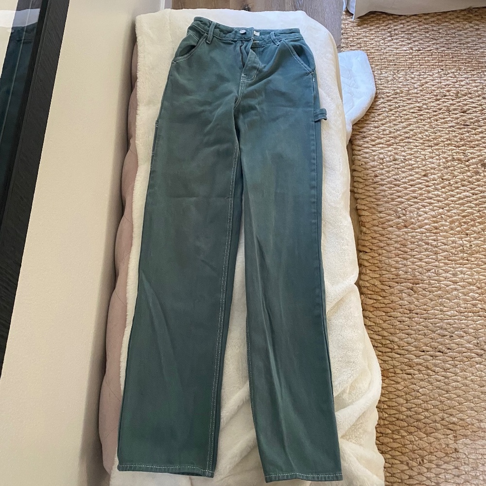 High rise green classic carpenter jeans.